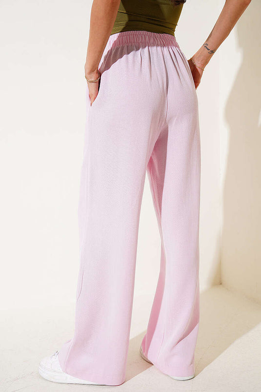 Pantalon en lin rose à taille élastique et jambes larges