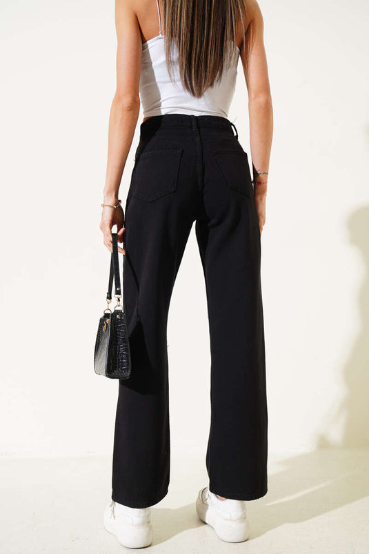 Jean noir décontracté à jambes larges