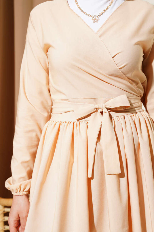 Ensemble deux pièces avec boléro et jupe, beige