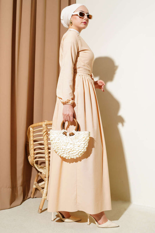 Ensemble deux pièces avec boléro et jupe, beige