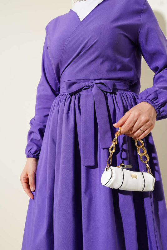 Ensemble deux pièces violet avec jupe boléro