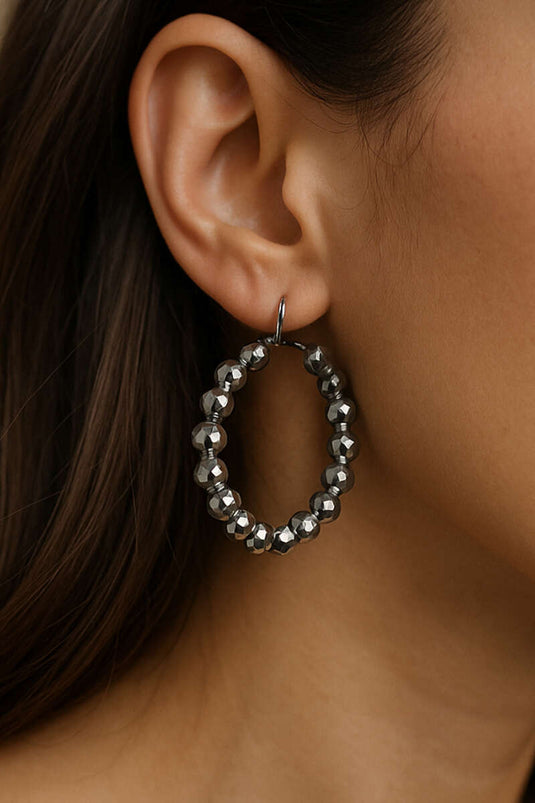 أقراط دائرية من الخرز الفضي