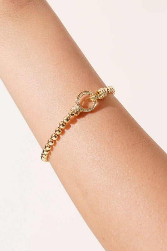 Pulsera con cierre y piedras con cuentas doradas
