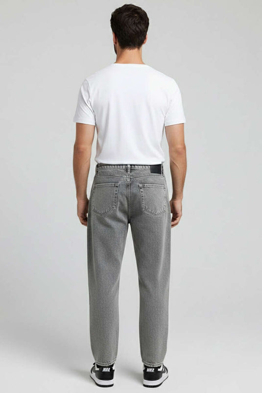 Pantalon homme gris à jambes étroites avec poches et tissu extensible