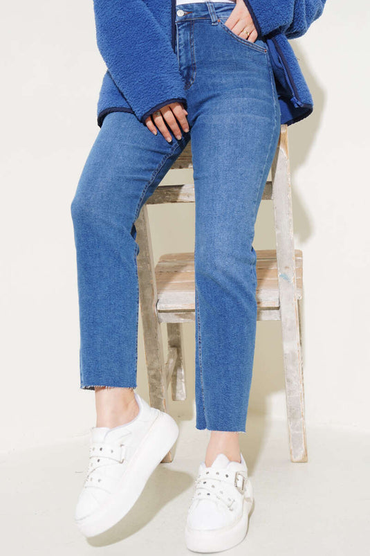 Pantalon en Jean déchiré à l'entrejambe, teinte bleue