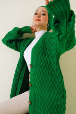 Gilet long vert en maille panier avec boutons sur le côté