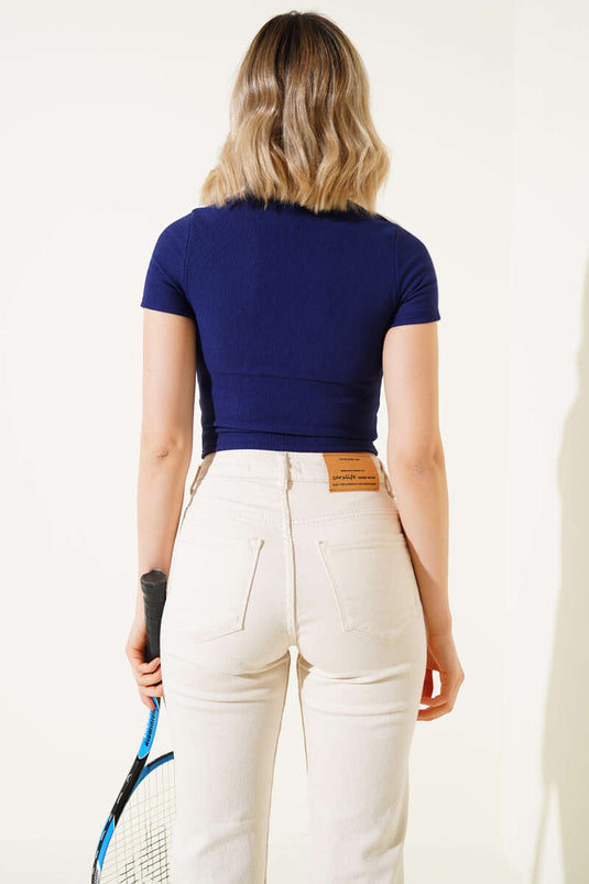 Haut court rayé bleu marine à fermeture éclair sur les épaules