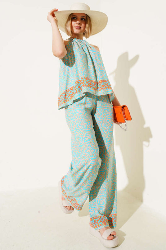 Costume deux pièces à motif ethnique avec cravate, couleur pétrole