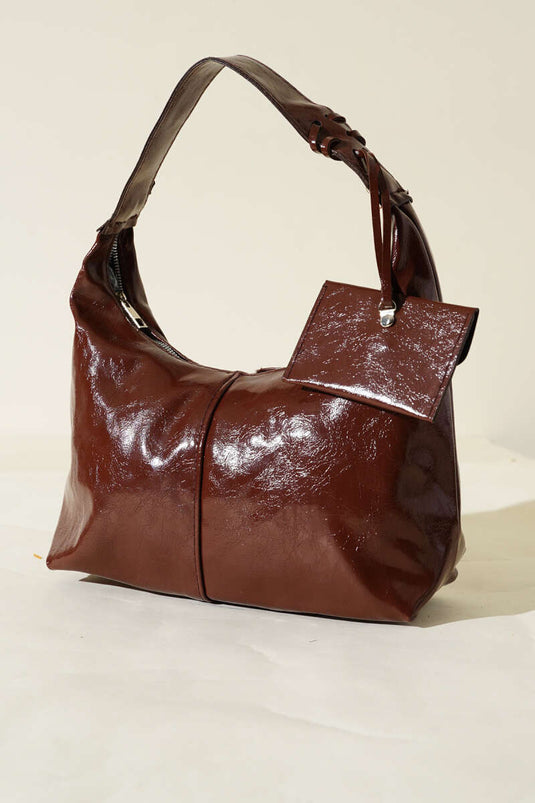 Borsa in pelle verniciata con portamonete, marrone