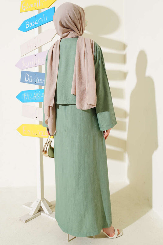 طقم بلوزة وسترة بأزرار من بريت مكون من قطعتين باللون الأخضر اللوزي