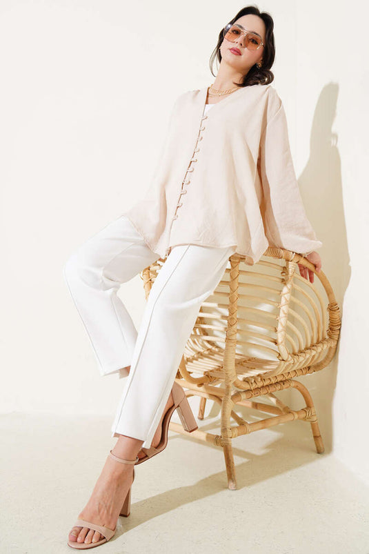 Brit blouse met knopen beige
