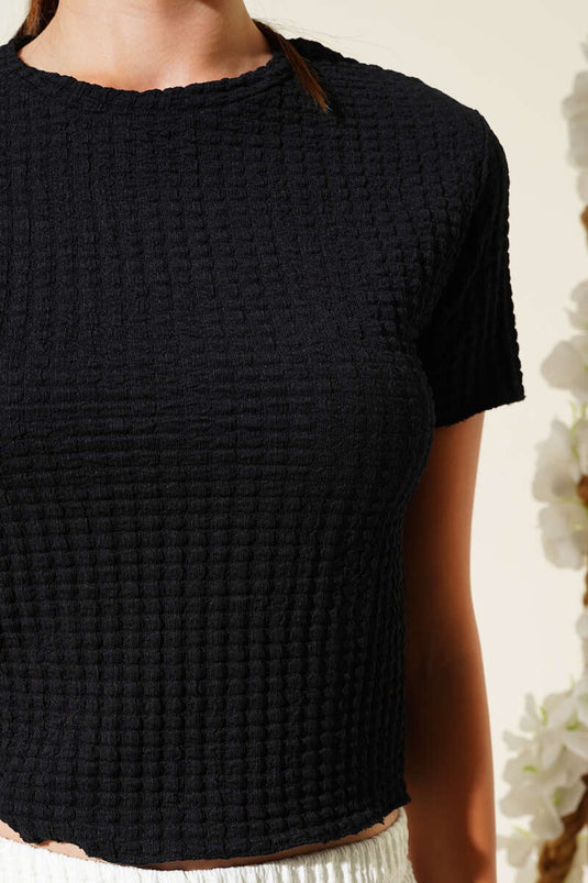 Crop top met bubbelpatroon in zwart