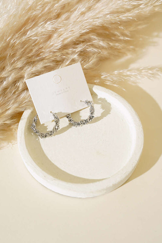 Boucles d'oreilles créoles torsadées en argent