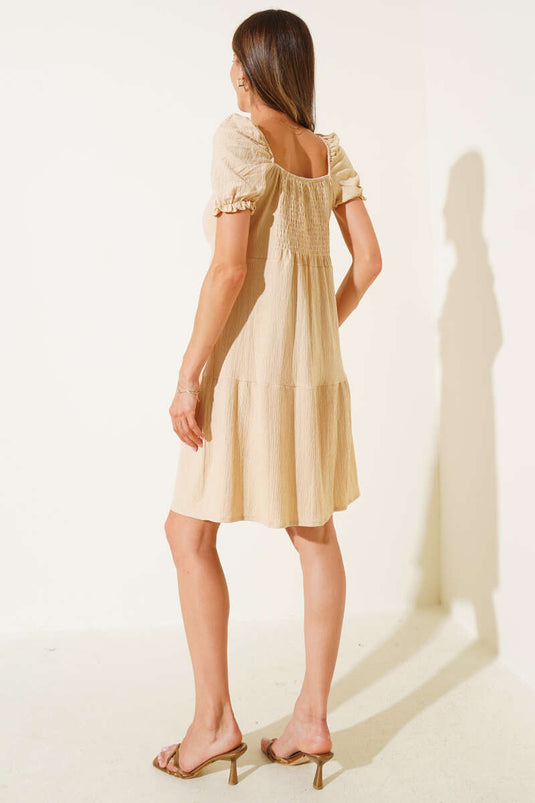 Robe crêpe à manches ballon couleur pierre