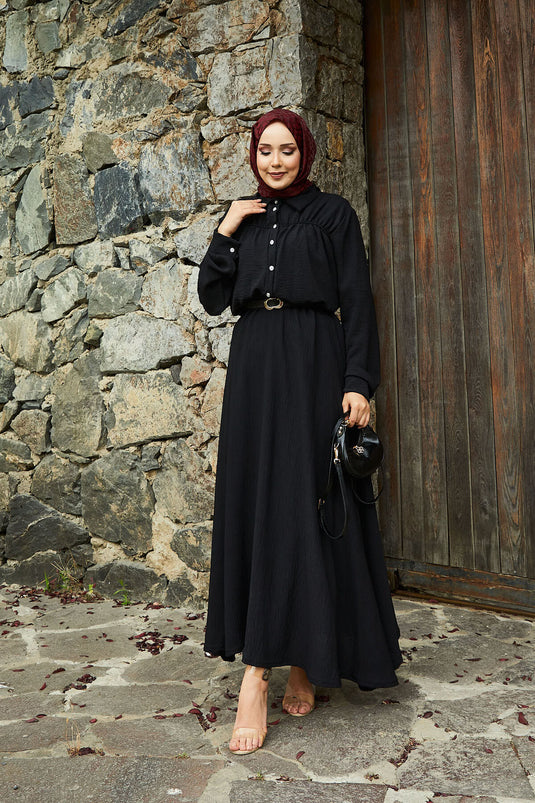 Tailleur jupe froncée et détaillée noire