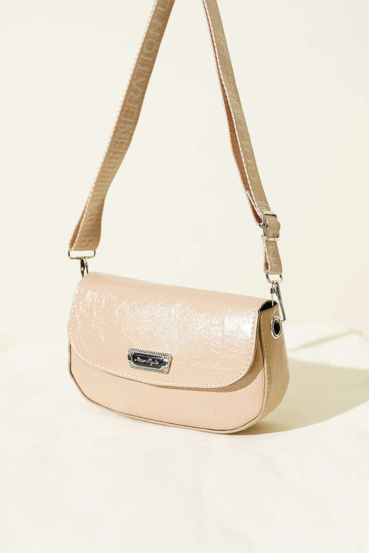Sac en cuir verni à bandoulière croisée beige