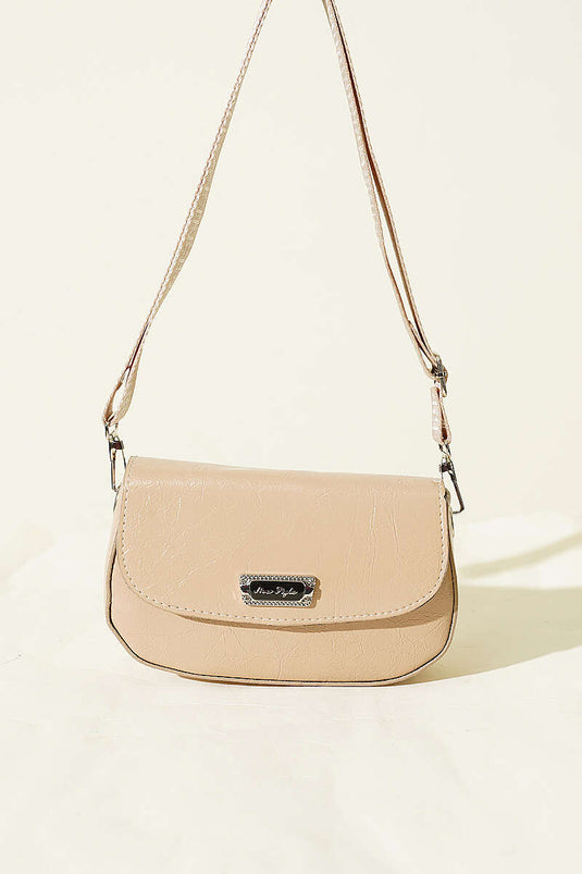 Sac en cuir verni à bandoulière croisée beige