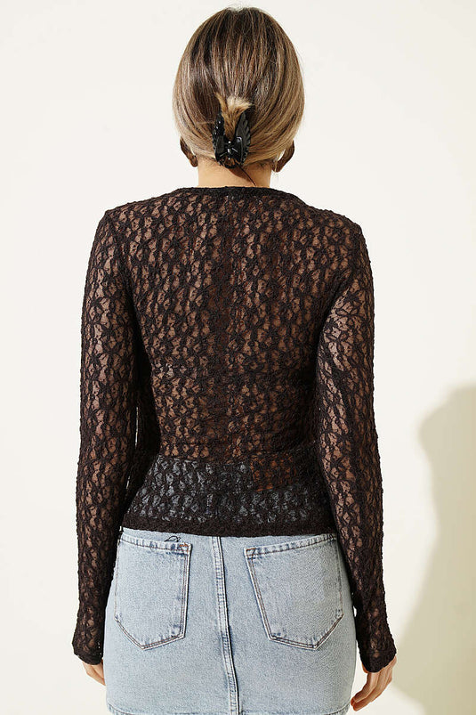 Blusa in pizzo con incrocio marrone