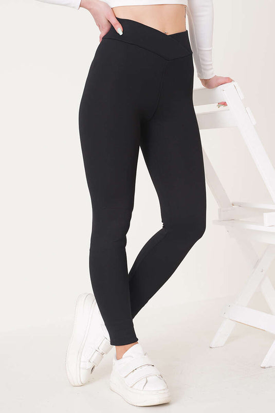 Leggings mit Kreuzgürtel in Schwarz