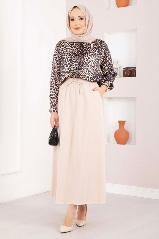 Jupe beige à ceinture élastiquée avec détails en perles