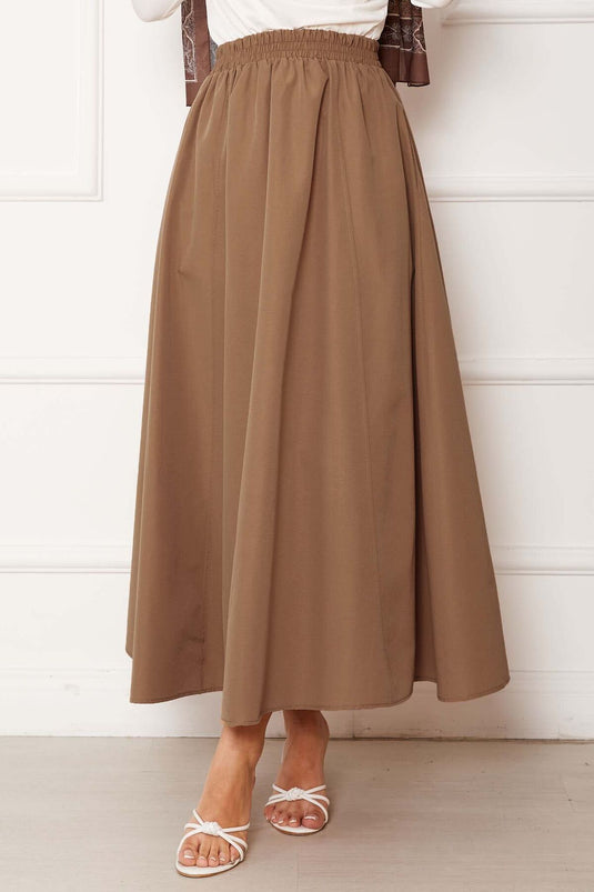 تنورة رياضية من تيريكوتون بتفاصيل جيب بلون القهوة بالحليب