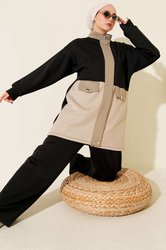 Combinaison de plongée deux pièces noire avec rabat de poche et détails soignés