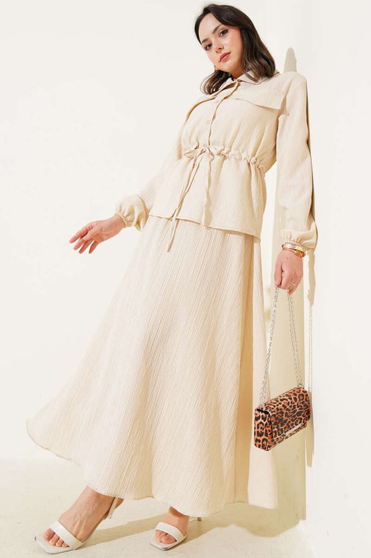 Completo a quadri beige con tasca, passante in vita e gonna