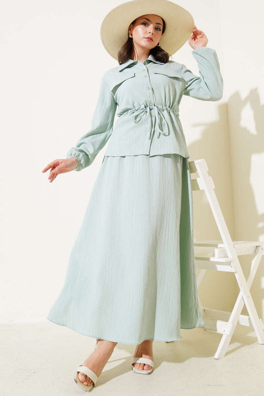 Combinaison portefeuille à taille basse et poches rabattues, couleur menthe