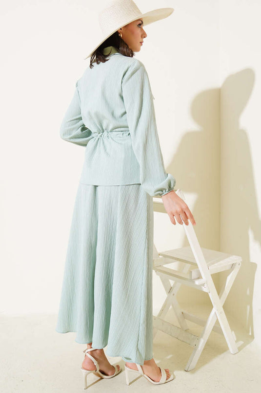 Combinaison portefeuille à taille basse et poches rabattues, couleur menthe