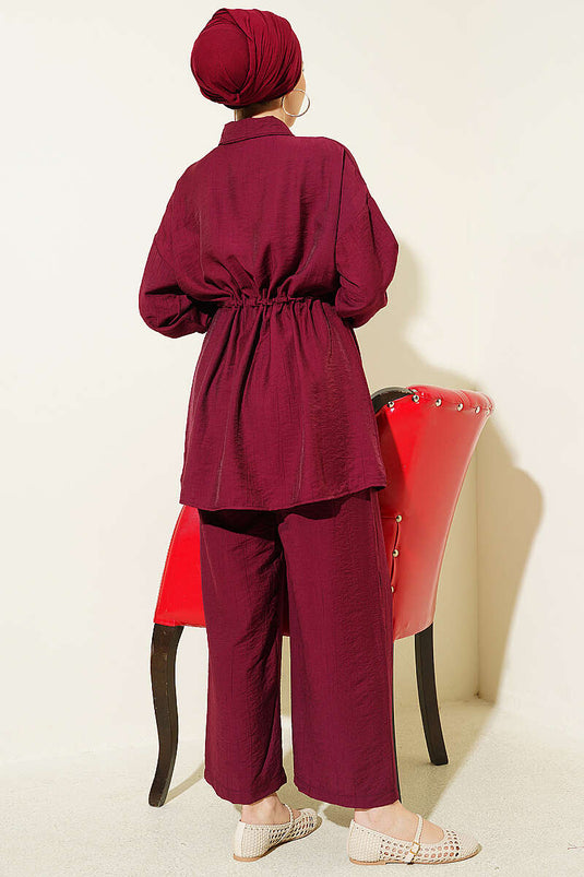 Ensemble deux pièces bordeaux avec ceinture tunnel et fermeture à glissière