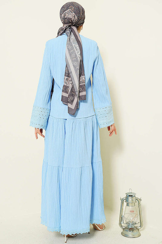 Ensemble jupe plissée brodée à poches et poignets bleu bébé