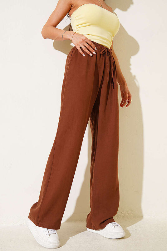 Pantalon en mousseline avec poches et taille élastique, couleur café