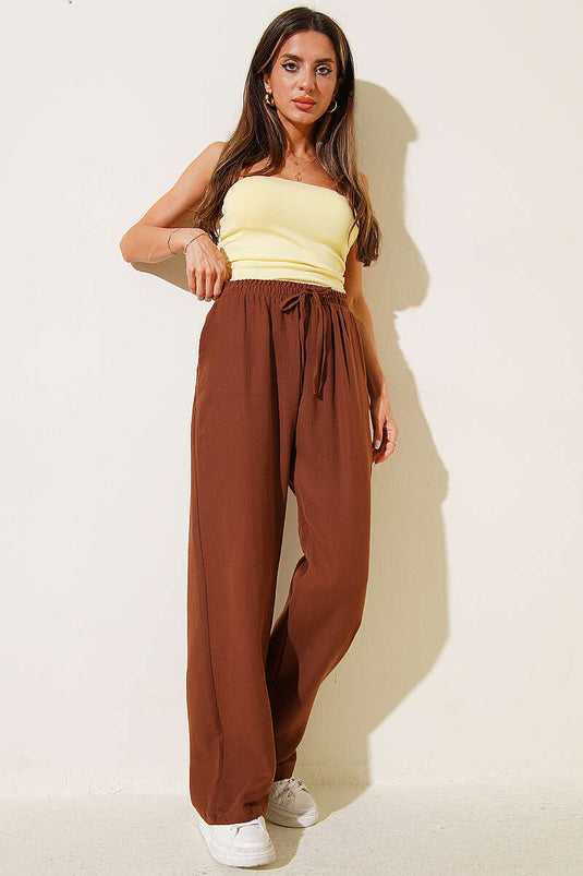 Pantalon en mousseline avec poches et taille élastique, couleur café