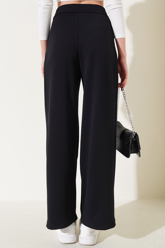 بنطلون فضفاض مطوي مع جيوب من برلمان