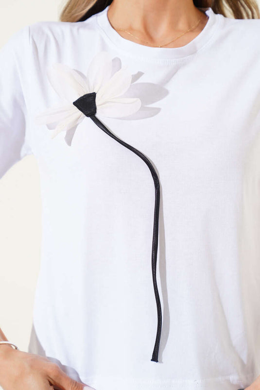 White T-Shirt with Floral Accessories