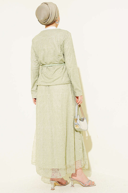 Ensemble deux pièces avec jupe à boutons-pression en dentelle, couleur vert pistache