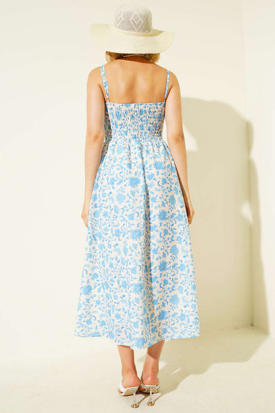 فستان ميدي أزرق بنقشة زهور وحمالات