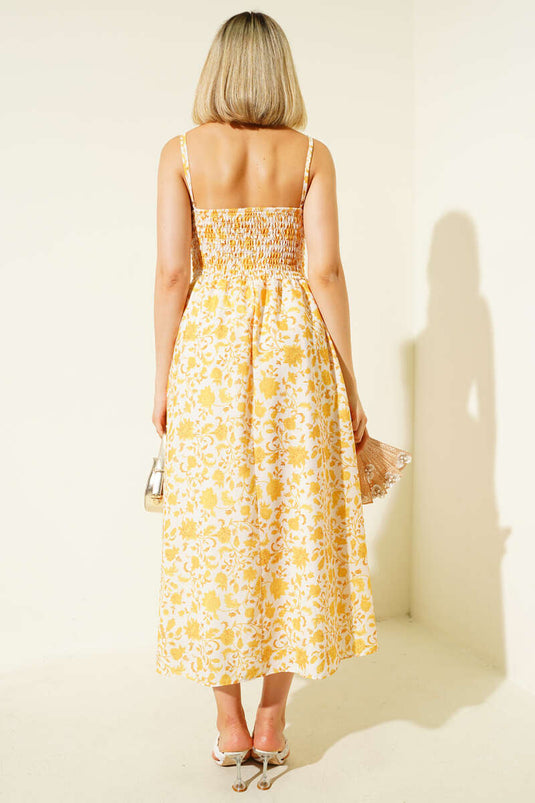 فستان ميدي أصفر اللون بنقشة زهور وحمالات رفيعة