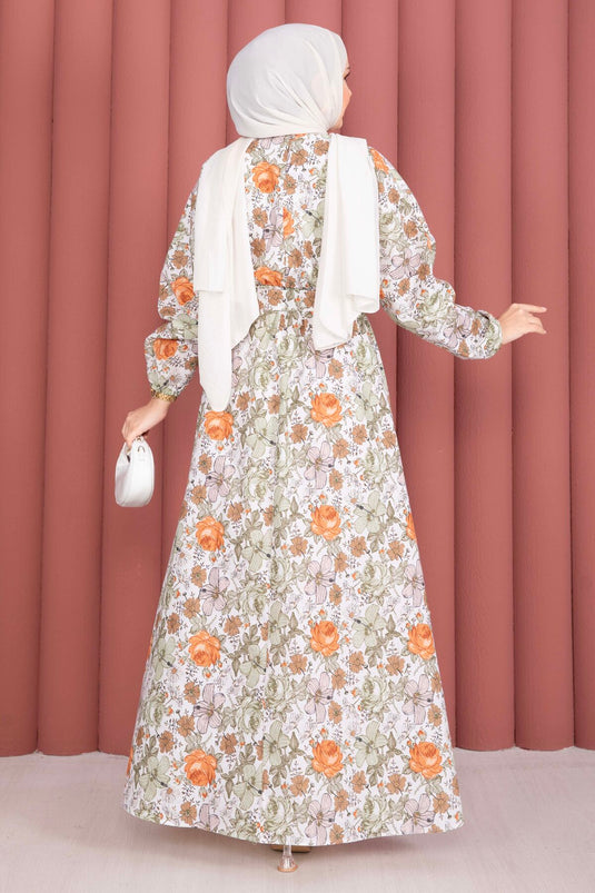 Robe verte à fleurs avec ceinture froncée à la taille