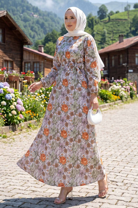 Robe verte à fleurs avec ceinture froncée à la taille