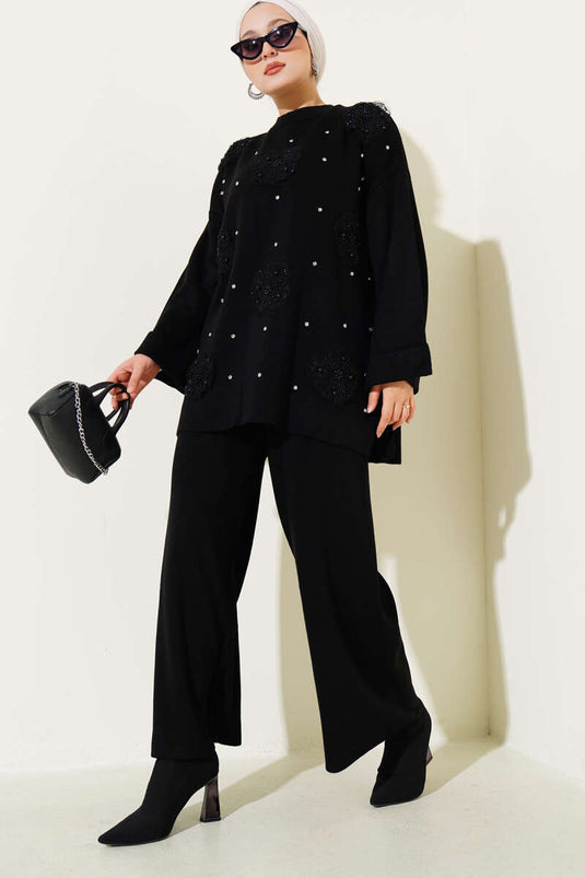 طقم تريكو من قطعتين بنقشة زهور باللون الأسود