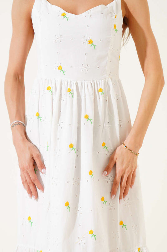 Gelbes Midikleid mit Blumenstickerei und Trägern