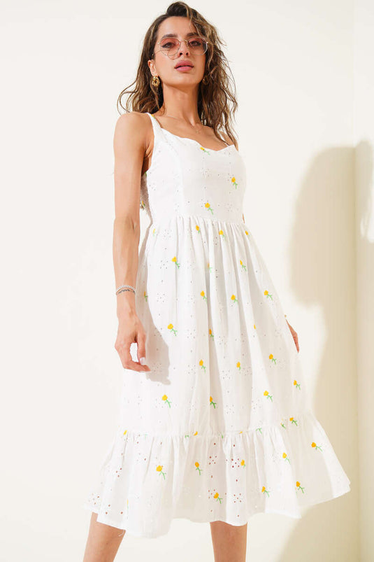 Gelbes Midikleid mit Blumenstickerei und Trägern