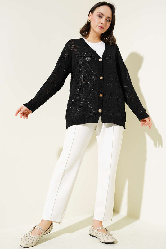 Schwarze Strickjacke mit Blumenmuster und Knöpfen