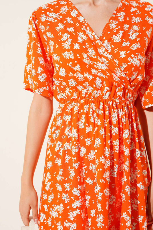 Robe orange à fleurs, taille élastique et manches courtes