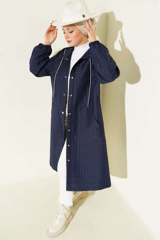 Manteau matelassé à capuche et boutons-pression bleu marine