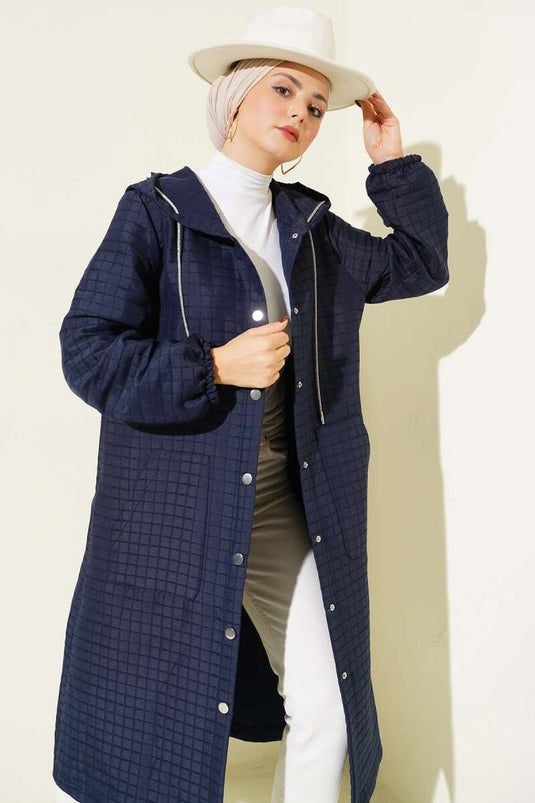 Manteau matelassé à capuche et boutons-pression bleu marine