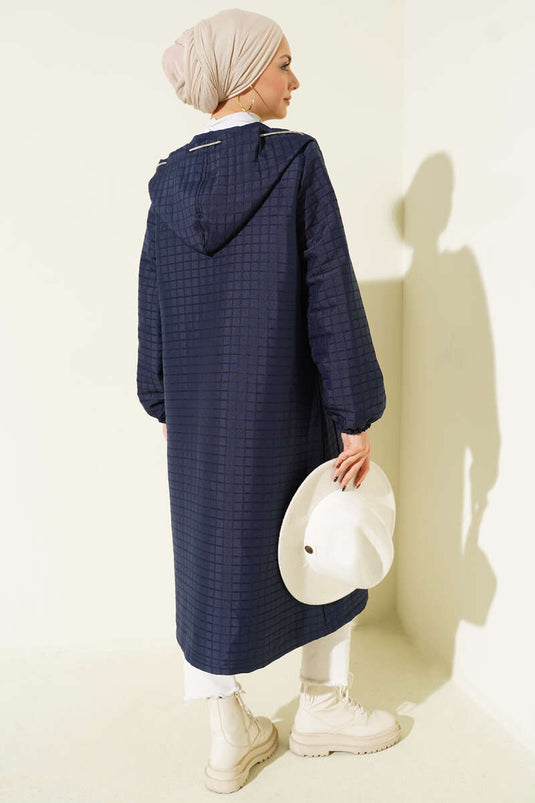 Manteau matelassé à capuche et boutons-pression bleu marine