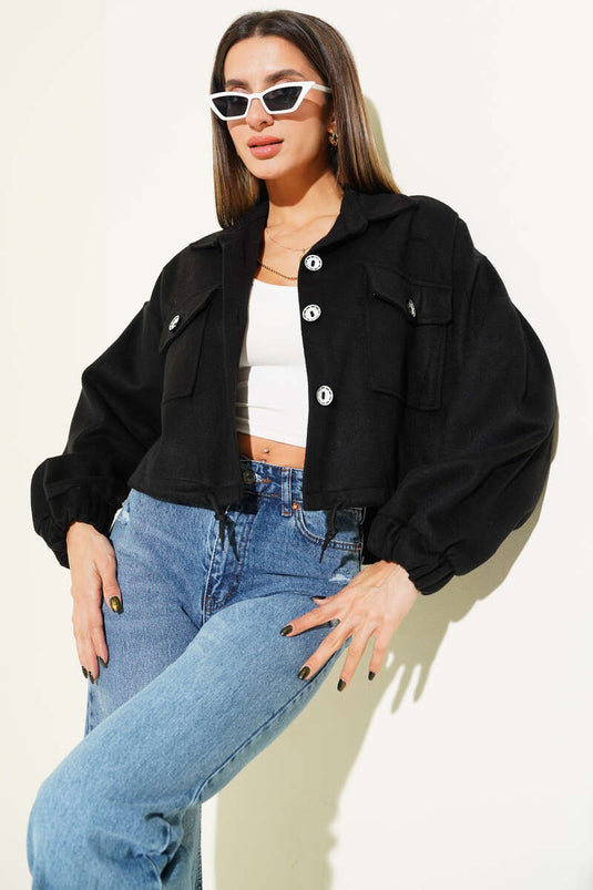 جاكيت كشمير أسود مزين بأزرار مخططة