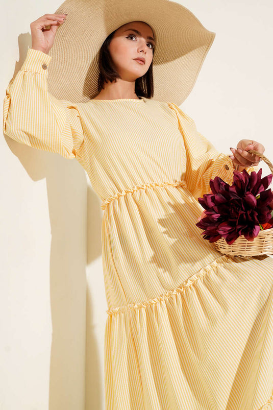 Gestreepte gelaagde jurk geel